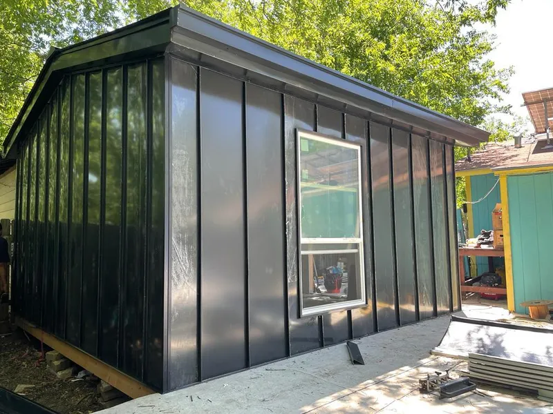 Black standing seam metal wall panels for Metal Roof Installation in Yankee Springs